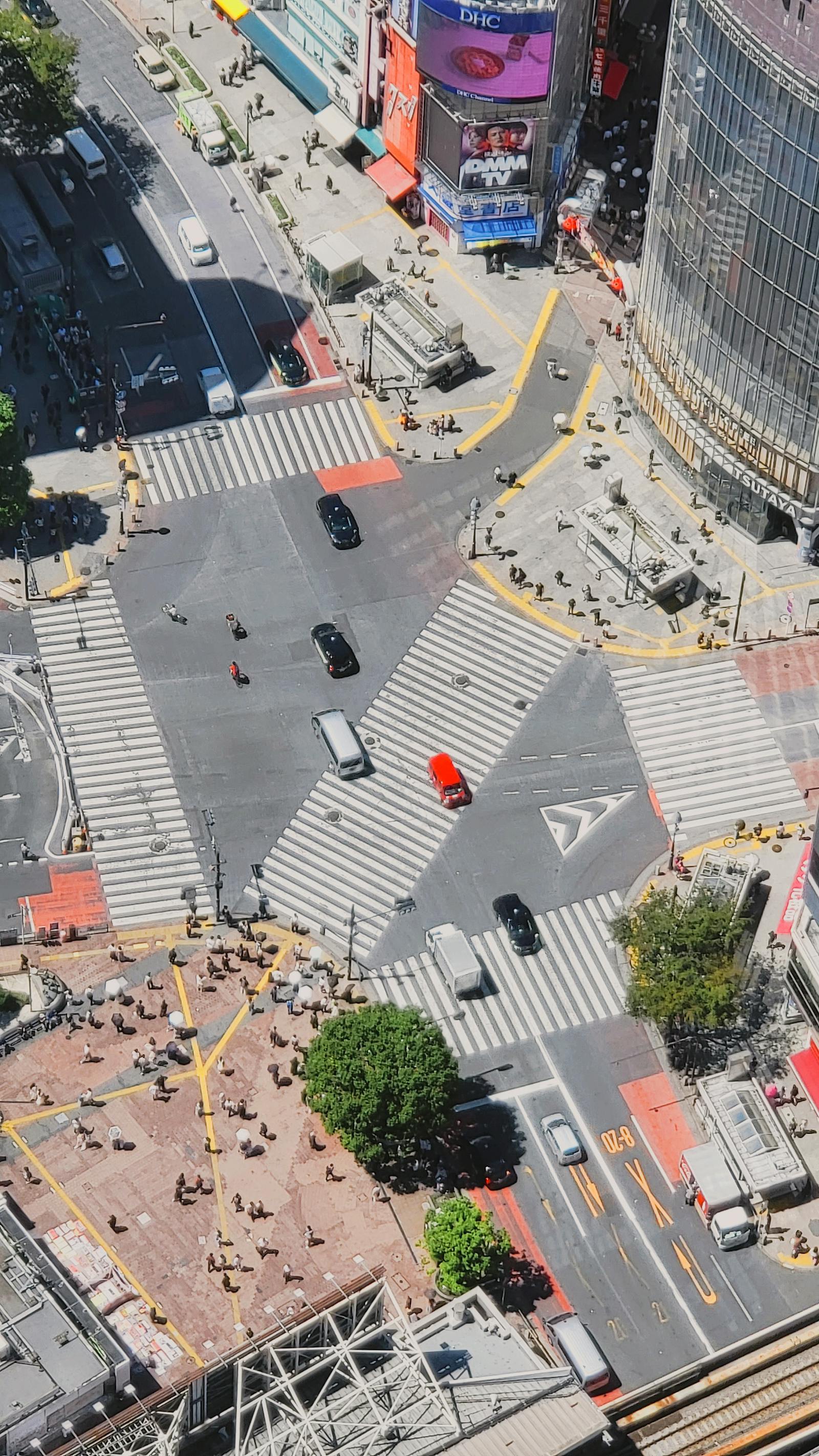 High aerial view of the Shibuya Scramble Crossing and surrounding streets